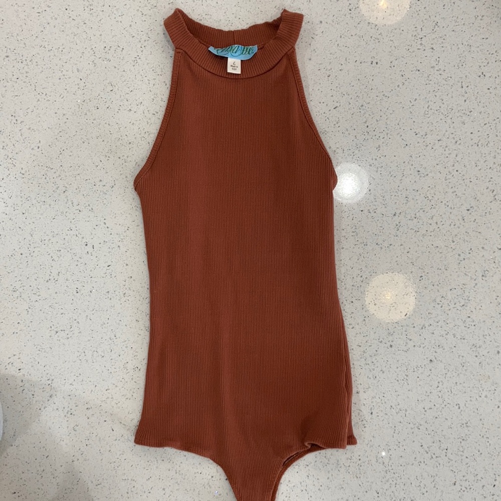 Francesca’s x Dina Be terra-cotta body suit